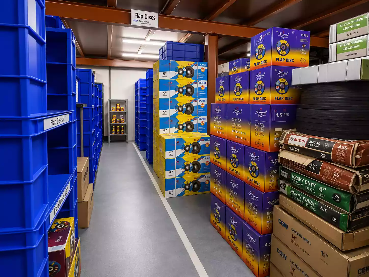 Aisle of flap discs and cutting wheels in the AKSD warehouse